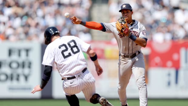 Jun 26, 2022; Bronx, New York, USA; Houston Astros shortstop Jeremy Pena (3) forces out New York Yankees designated hitter Josh Donaldson (28) and throws to first to complete a double play on a ball hit by Yankees left fielder Aaron Hicks (not pictured) during the fifth inning at Yankee Stadium.