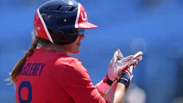Team United States center fielder Haylie McCleney (8) celebrates after hitting a triple during the first inning against Australia during the Tokyo 2020 Olympic Summer Games at Yokohama Baseball Stadium