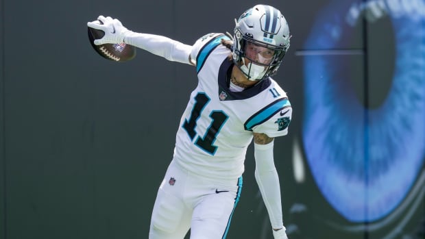 Panthers wide receiver Robby Anderson (11) celebrates his touchdown reception from quarterback Sam Darnold.