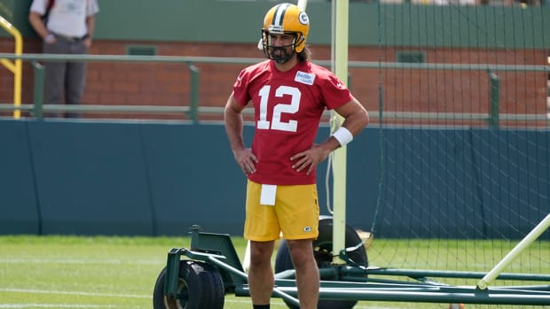 Packers quarterback Aaron Rodgers runs a drill.