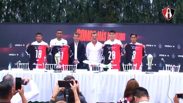 Atlas' signings pose for the cameras