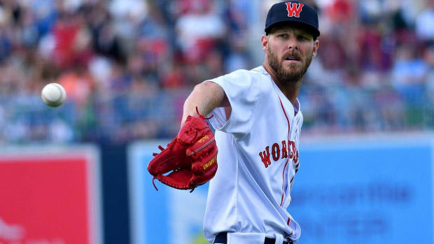 Red Sox pitcher Chris Sale catches a ball in a rehab start for the Worcester Woo Sox.