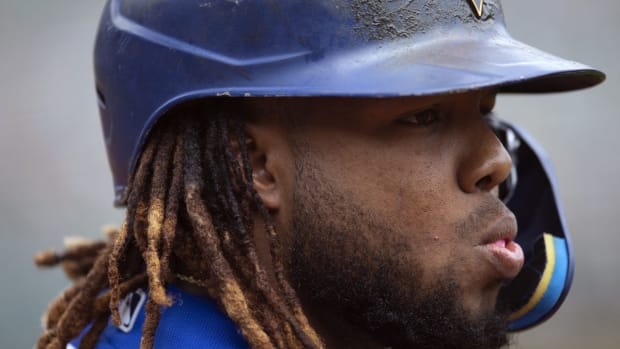 Jul 6, 2022; Oakland, California, USA; Toronto Blue Jays first baseman Vladimir Guerrero Jr. (27) waits in the on deck circle during the first inning against the Oakland Athletics at RingCentral Coliseum. Mandatory Credit: D. Ross Cameron-USA TODAY Sports