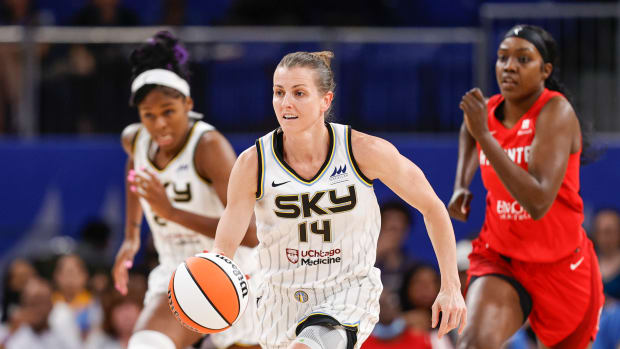 Jun 17, 2022; Chicago, Illinois, USA; Chicago Sky guard Allie Quigley (14) brings the ball up court against the Atlanta Dream during the second half of a WNBA game at Wintrust Arena.