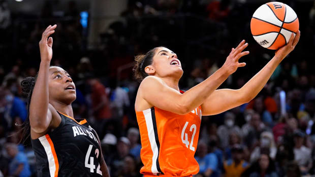 Kelsey Plum drives past Jewell Loyd during the 2022 WNBA All-Star game.