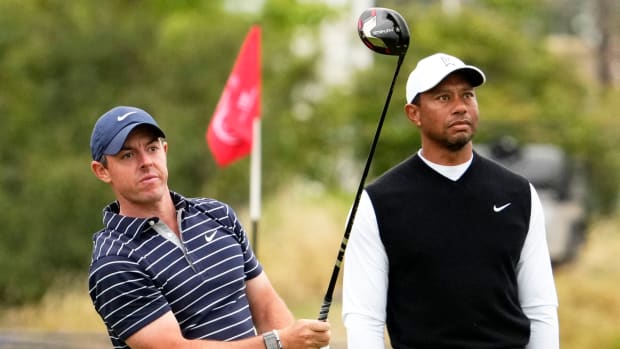 Rory McIlroy and Tiger Woods play a practice round at St. Andrews.