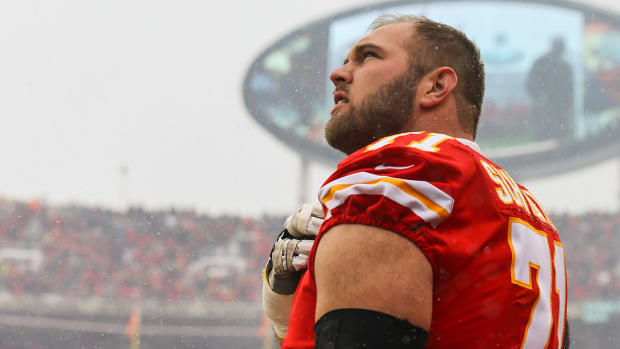 Chiefs offensive tackle Mitchell Schwartz (71) observes the national anthem before an AFC Divisional playoff game against the Colts at Arrowhead Stadium.