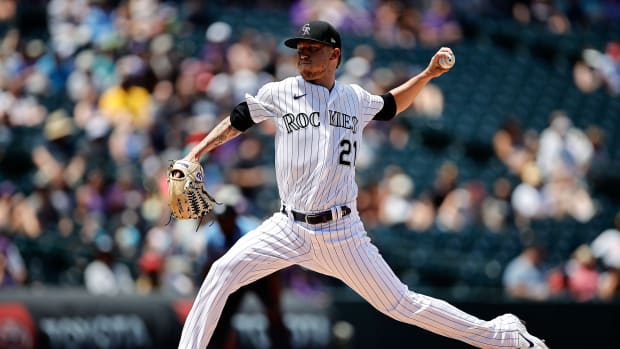 Jul 14, 2022; Denver, Colorado, USA; Colorado Rockies starting pitcher Kyle Freeland (21) pitches in the first inning against the San Diego Padres at Coors Field.