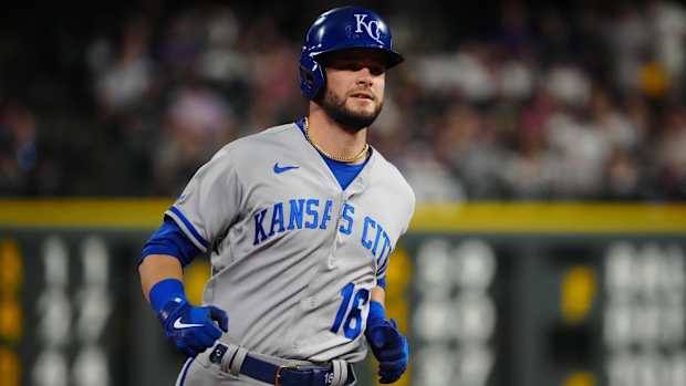 Royals outfielder Andrew Benintendi rounds the bases after hitting a home run.