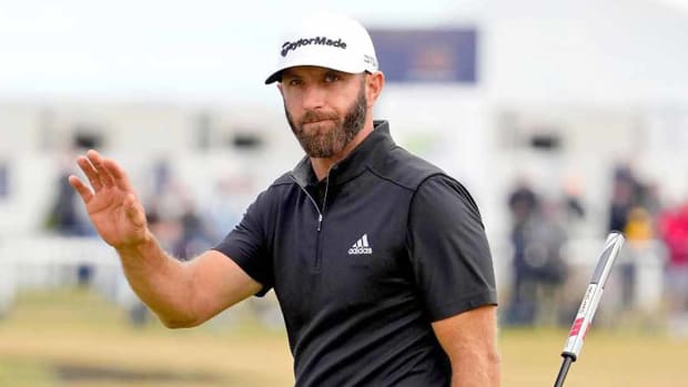 Dustin Johnson acknowledges the crowd in the second round of the 2022 British Open.