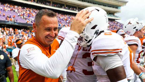 Oct 2, 2021; Fort Worth, Texas, USA; Texas Longhorns head coach Steve Sarkisian laughs with defensive back D'Shawn Jamison (5) after the game against the TCU Horned Frogs at Amon G. Carter Stadium.