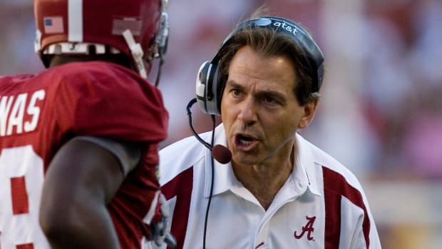 Alabama Crimson Tide head coach Nick Saban talks to (28) Javier Arenas during the game against the LSU Tigers at Bryant Denny Stadium in Tuscaloosa, AL.