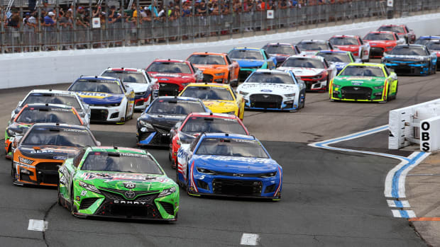 Martin Truex Jr., and Kyle Larson lead the field during Sunday's  NASCAR Cup Series Ambetter 301 at New Hampshire Motor Speedway. (Photo by James Gilbert/Getty Images)