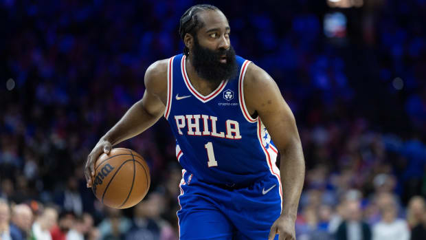 76ers guard James Harden (1) dribbles the ball up the court during the third quarter of a game against the Raptors.