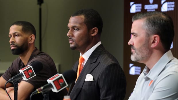 Cleveland Browns quarterback Deshaun Watson, center, along with General Manager Andrew Berry, left, and head coach Kevin Stefanski, right, field questions from reporters during Watson's introductory press conference at the Cleveland Browns Training Facility in Berea. Watsonpress File 3
