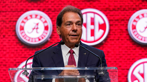 Alabama head coach Nick Saban speaks on the stage during the SEC Media Days at the College Football Hall of Fame.
