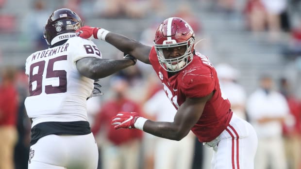 Alabama linebacker Will Anderson Jr. (31) chucks Texas A&M tight end Jalen Wydermyer (85) in pass coverage during Alabama's game with Texas A&M Saturday, Oct. 3, 2020, in Bryant-Denny Stadium.