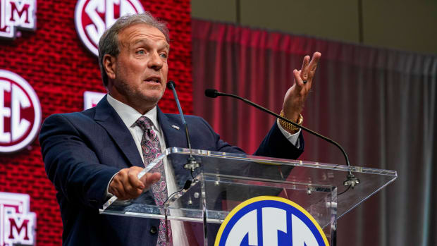 Texas A&M head coach Jimbo Fisher shown on the stage during SEC Media Days at the College Football Hall of Fame.