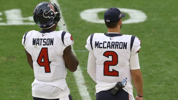 Texans quarterbacks Deshaun Watson (4) and AJ McCarron (2) look on from the sidelines against the Steelers during the third quarter at Heinz Field.