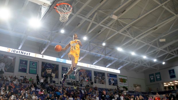 Life Christian's Hansel Enmanuel Donato (24) dunks the ball during the 2021 City of Palms Classic Edison Bank SLAM DUNK Contest, Sunday, Dec. 19, 2021, at Suncoast Credit Union Arena in Fort Myers, Fla. Life Christian's Hansel Enmanuel Donato (24) won the slam dunk contest.