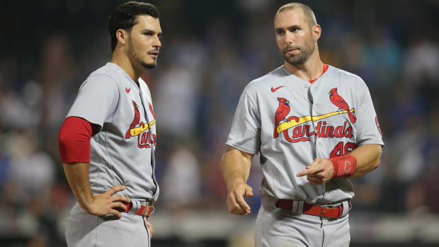 Cardinals third baseman Nolan Arenado and first basemen Paul Goldschmidt talk on the field in between innings.