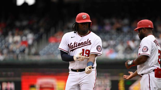 Jul 17, 2022; Washington, District of Columbia, USA; Washington Nationals first baseman Josh Bell (19) reacts after hitting a single against the Atlanta Braves during the sixth inning at Nationals Park.