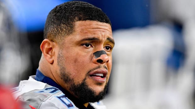 Titans guard Rodger Saffold with his helmet off on the sidelines.