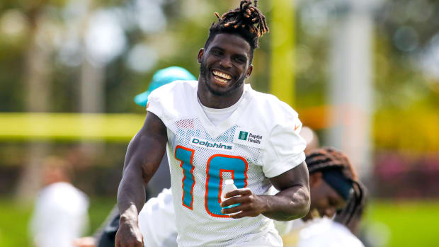 Jun 2, 2022; Miami Gardens, Florida, USA; Miami Dolphins wide receiver Tyreek Hill (10) reacts from the field during minicamp at Baptist Health Training Complex. Mandatory Credit: Sam Navarro-USA TODAY Sports