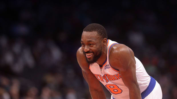 Knicks guard Kemba Walker (8) during a time out in the first half against the Hornets at the Spectrum Center.