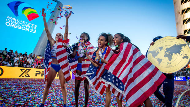 The U.S. women’s 4x400m relay team celebrates at the 2022 world championships.