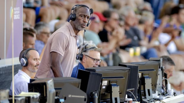 Former U.S. sprinter Michael Johnson looks on during a race at the 2022 World Track & Field Championships.