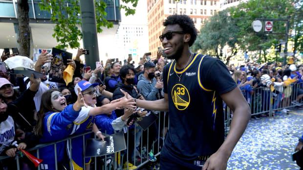 Jun 20, 2022; San Francisco, CA, USA; Golden State Warriors center James Wiseman (33) meets with fans during the Warriors championship parade in downtown San Francisco. Mandatory Credit: Cary Edmondson-USA TODAY Sports