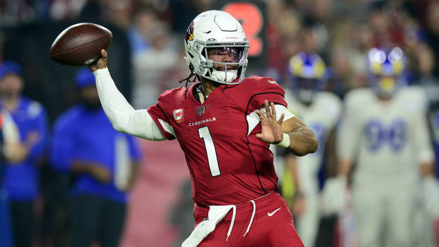 Kyler Murray throws a pass against the Rams