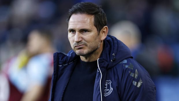 Frank Lampard looks dejected while watching Everton's 3-2 loss at Burnley in April 2022