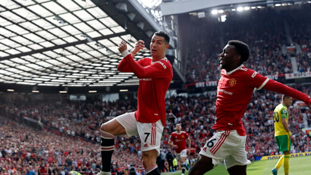 Cristiano Ronaldo (left) celebrates with Anthony Elanga after scoring for Manchester United against Norwich