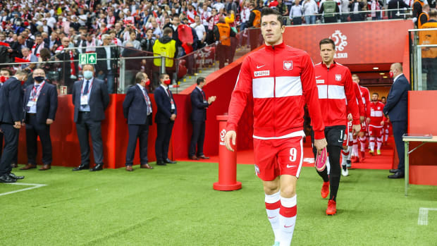 Robert Lewandowski pictured leading out the Poland national team for a World Cup qualifier against England in September 2021