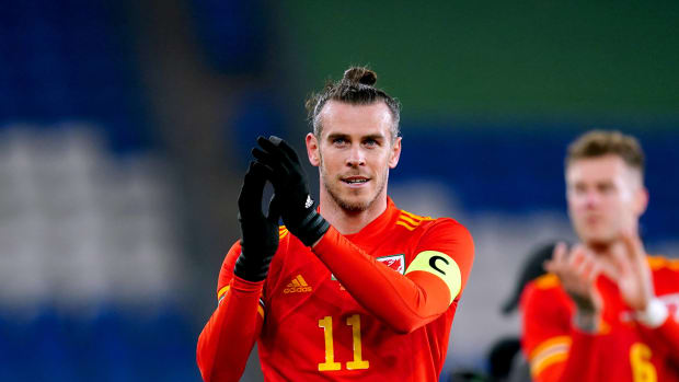 Gareth Bale pictured applauding Wales fans after his team's 2-1 win over Austria in March 2022