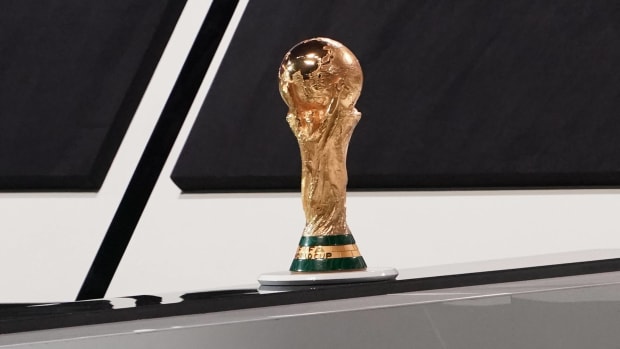 The World Cup trophy is pictured on display at a FIFA congress in March 2022