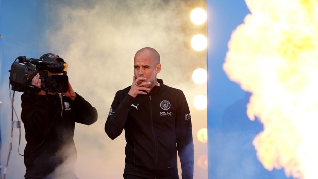 Pep Guardiola pictured smoking a cigar the day after Manchester City were crowned 2021/22 Premier League champions