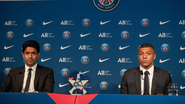 PSG president Nasser Al-Khelaifi (left) faces the media alongside Kylian Mbappe in May 2022