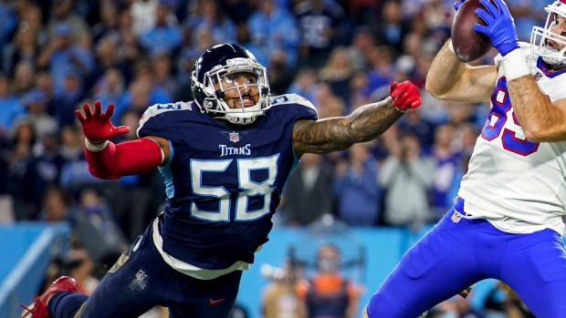 Buffalo Bills tight end Tommy Sweeney (89) scores a touchdown past Tennessee Titans linebacker Harold Landry III (58) during the third quarter at Nissan Stadium in Nashville, Tenn., Monday, Oct. 18, 2021.