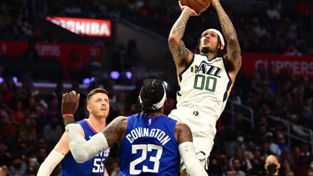 Utah Jazz guard Jordan Clarkson (00) shoots over Los Angeles Clippers forward Robert Covington (23) in the first half of the game at Crypto.com Arena.