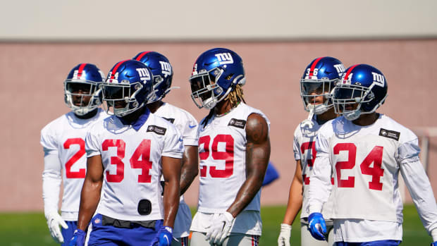 New York Giants safety Xavier McKinney (29) and the defense on the first day of training camp at Quest Diagnostics Training Center in East Rutherford on Wednesday, July 27, 2022.