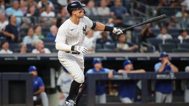 New York Yankees right fielder Aaron Judge (99) hits a two run home run in the third inning against the Kansas City Royals at Yankee Stadium.