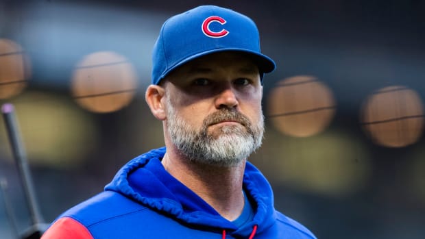 Chicago Cubs manager David Ross (3) walks back to the dugout before the game against the San Francisco Giants.