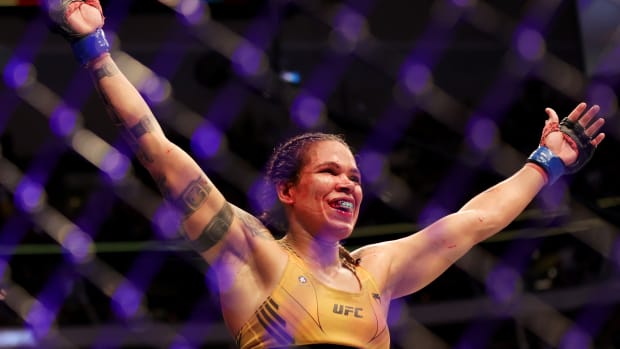 Amanda Nunes of Brazil celebrates after defeating Julianna Pena in their bantamweight title bout during UFC 277 at American Airlines Center on July 30, 2022 in Dallas, Texas. Amanda Nunes won via unanimous decision.