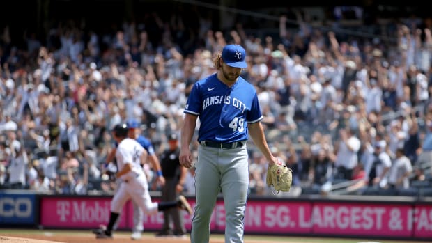 Jul 30, 2022; Bronx, New York, USA; Kansas City Royals starting pitcher Jonathan Heasley (49) reacts after allowing a solo home run to New York Yankees first baseman DJ LeMahieu (26) during the first inning at Yankee Stadium. Mandatory Credit: Brad Penner-USA TODAY Sports