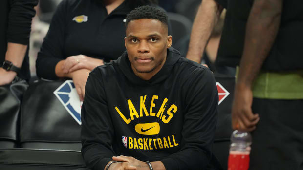 Lakers guard Russell Westbrook (0) sits on the bench before the game against the Warriors at Chase Center.