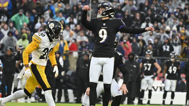 Ravens kicker Justin Tucker (9) kicks a field goal during the fourth quarter of a game against the Steelers.