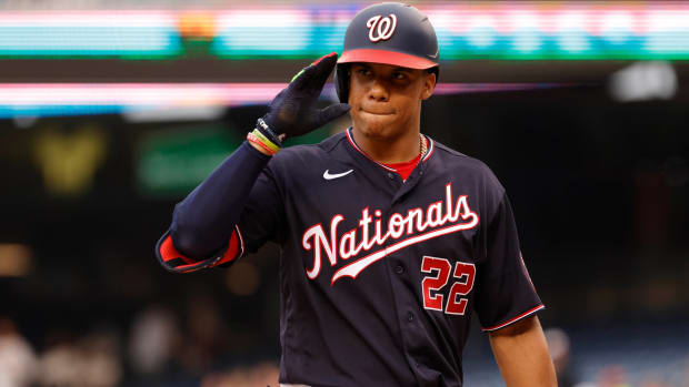 Nationals right fielder Juan Soto (22) gestures to the Cardinals dugout before his at bat during the first inning at Nationals Park.
